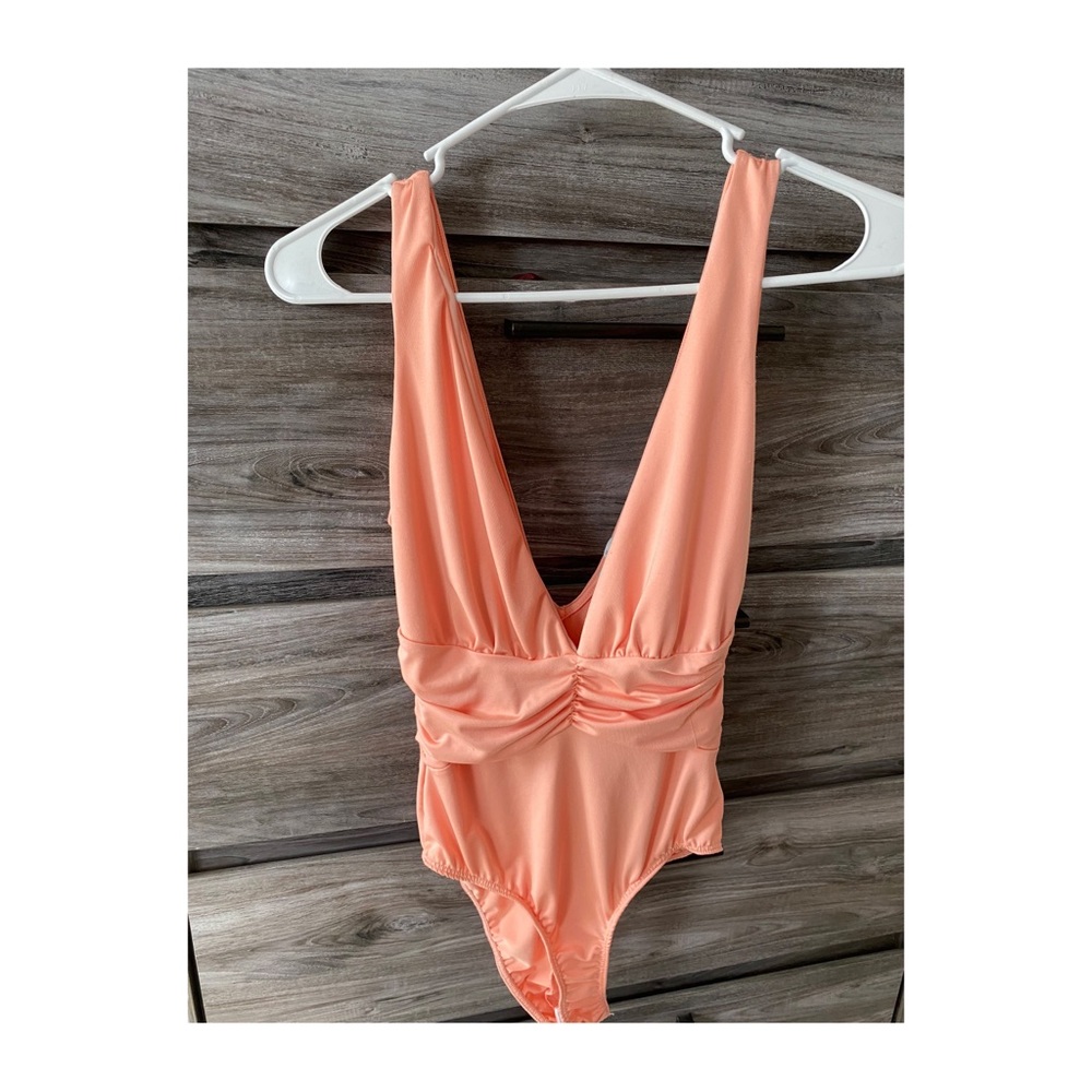 Charlotte Russe V cut body suit